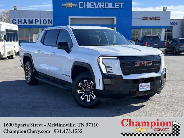 2026 GMC Sierra EV Elevation Standard Range in Summit White — front three-quarter view