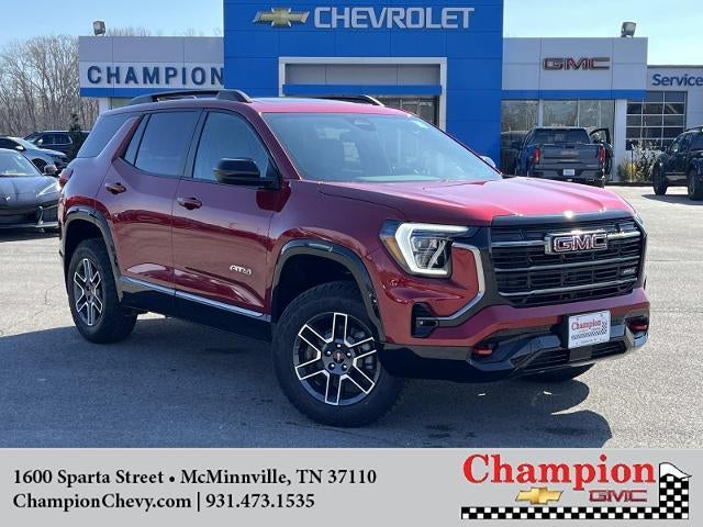 2026 GMC Terrain AT4 in Volcanic Red Tintcoat — front three-quarter view