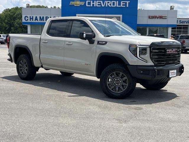 2026 GMC Sierra 1500 AT4X in Coastal Dune — front three-quarter view