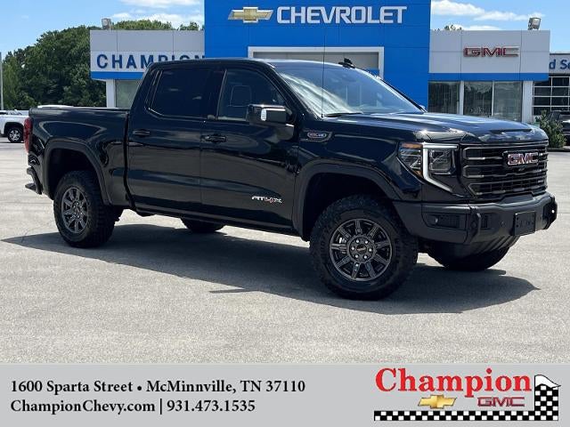 2026 GMC Sierra 1500 AT4X in Onyx Black — front three-quarter view